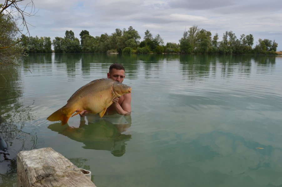 Oliver marshall with a 35lb mirror