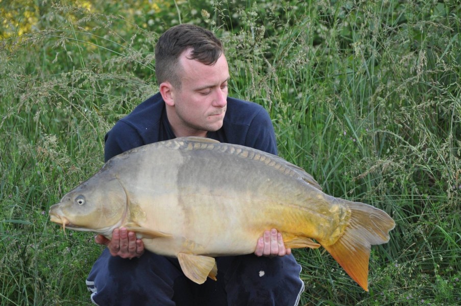 Jake with a 27lbs mirror