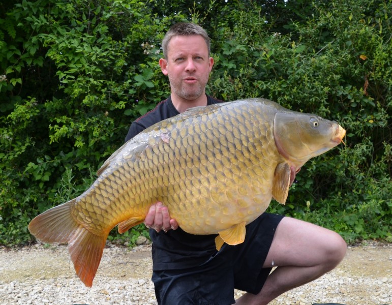 Stefan with the Lake Record Common at 44lbs