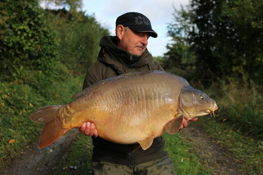 Beast of a mirror known as "Huckleberry" at 44lb 8oz for John Allen.