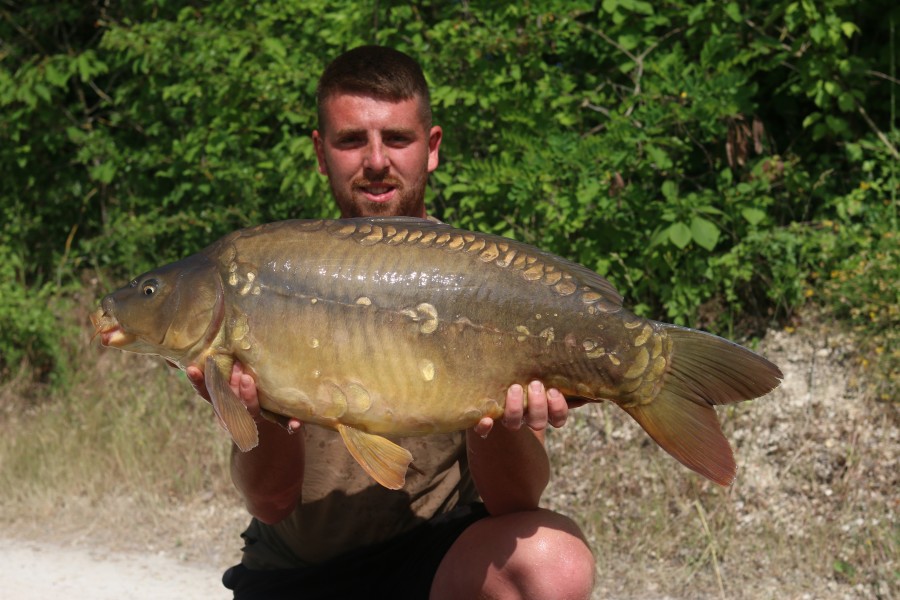 Lovely small mirror for Jordan at 21lb 10oz.  The second of his brace capture.